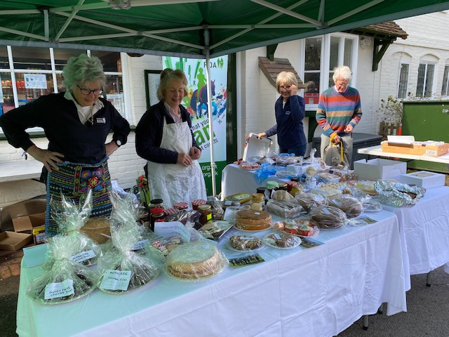 display of homemade baked goods with Newbury Riding for the Disabled volunteers